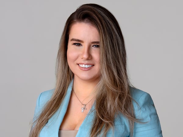Modern LinkedIn headshot for NYC real estate female professional at Astoria Queens